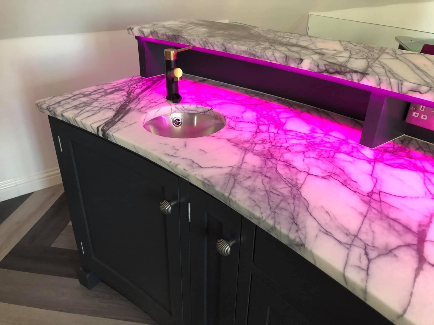 A bespoke drinks bar with integrated sink