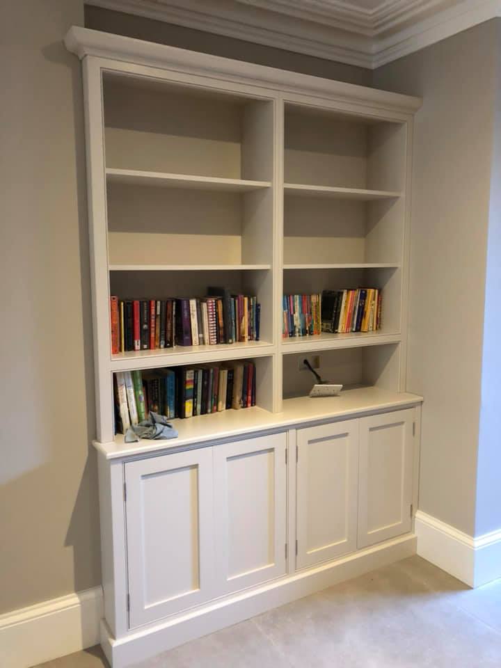 Books on a white custom built bookcase