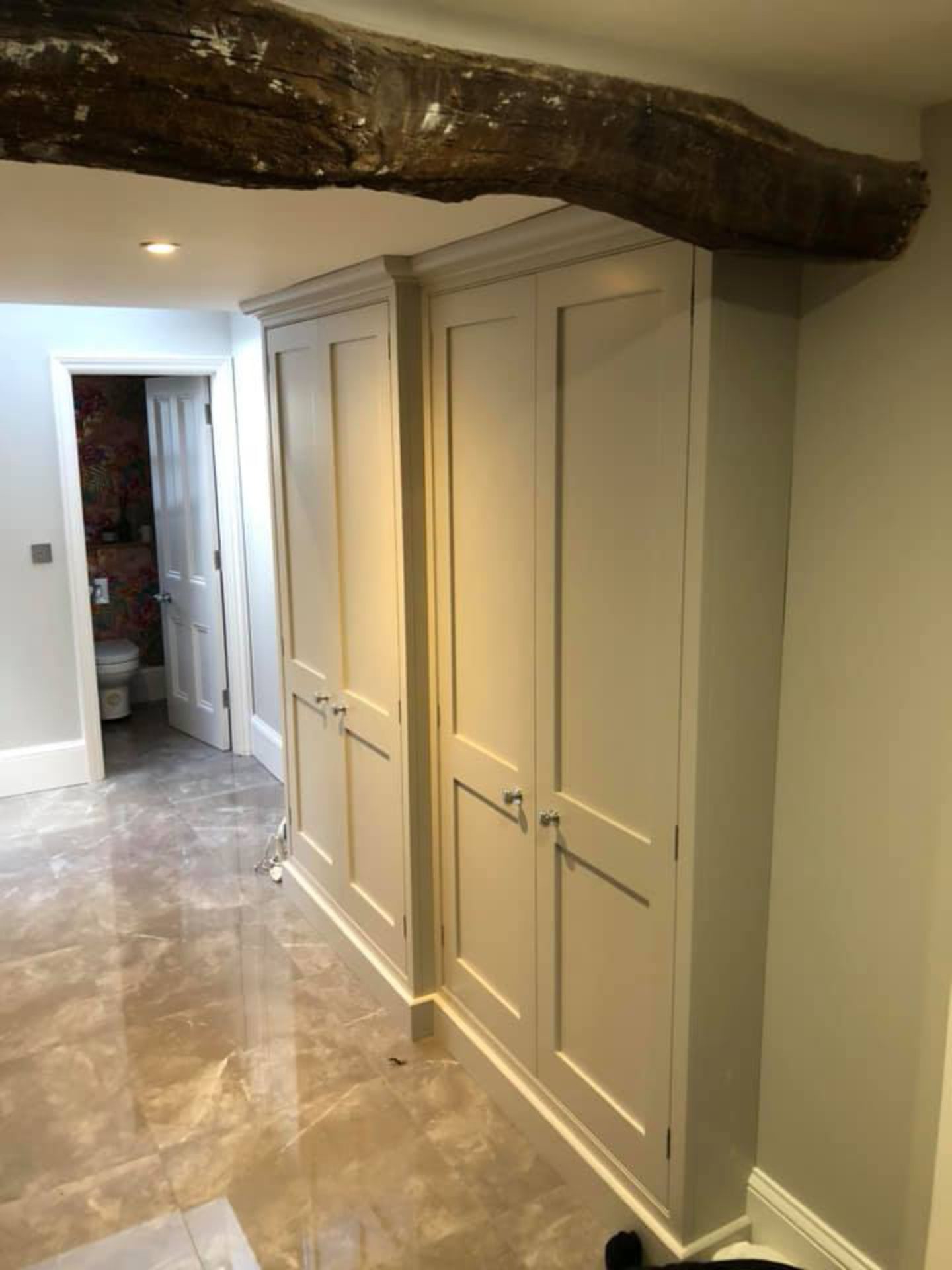 A bespoke storage solution fitted in a hallway