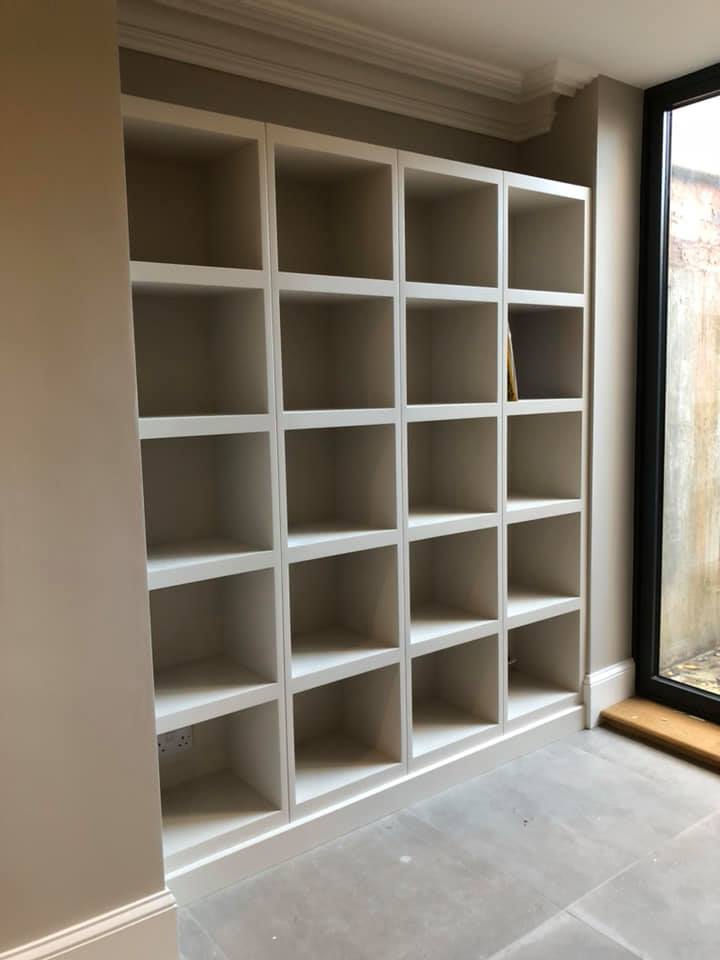 A custom built bookcase built into a wall