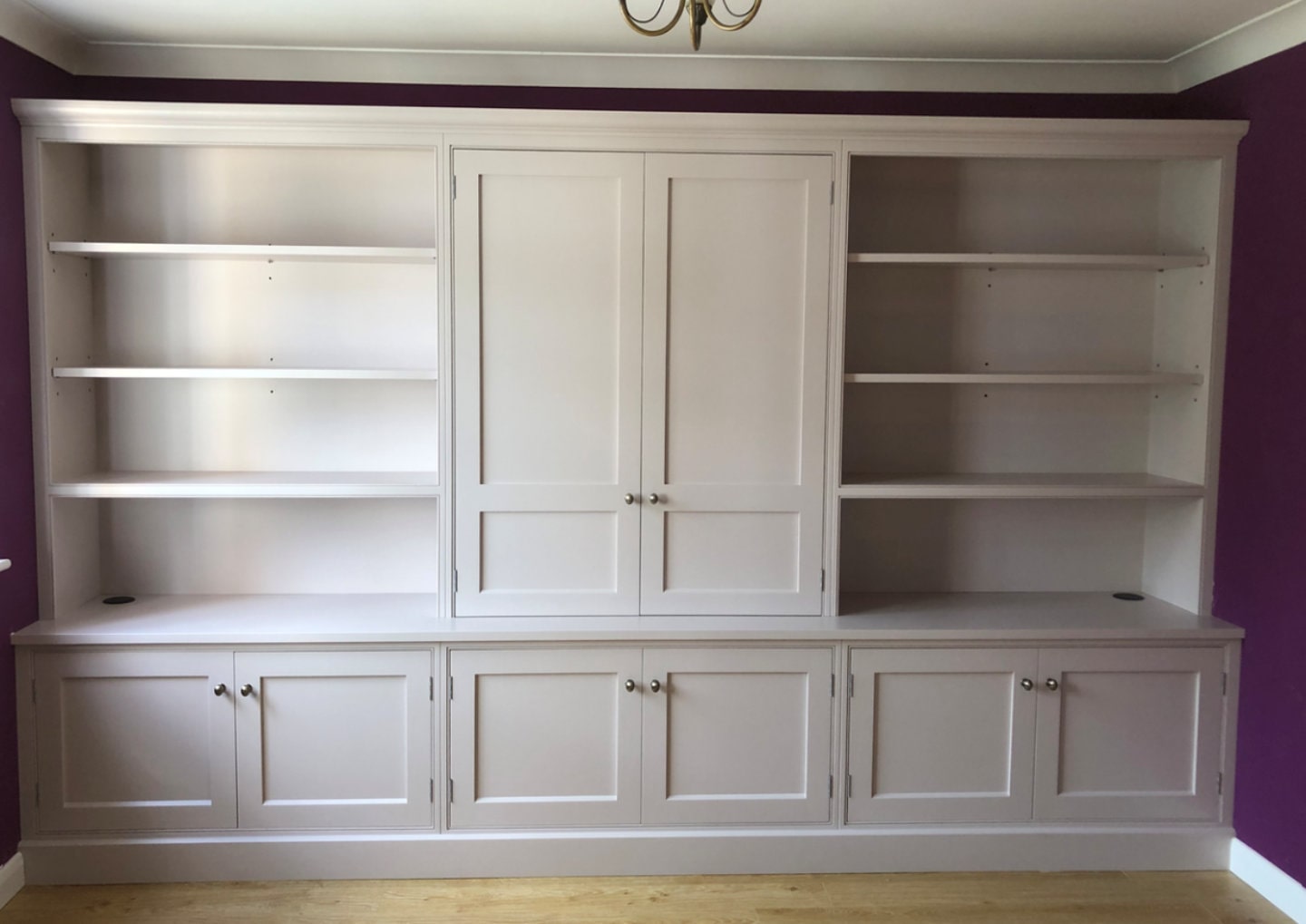 A beautiful, full width, bespoke bookcase.