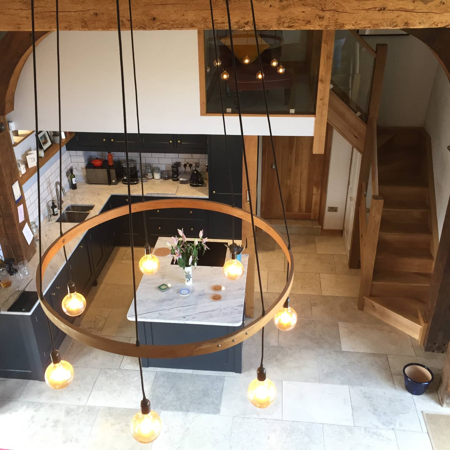 A top view of a bespoke kitchen which has been fitted in a barn.