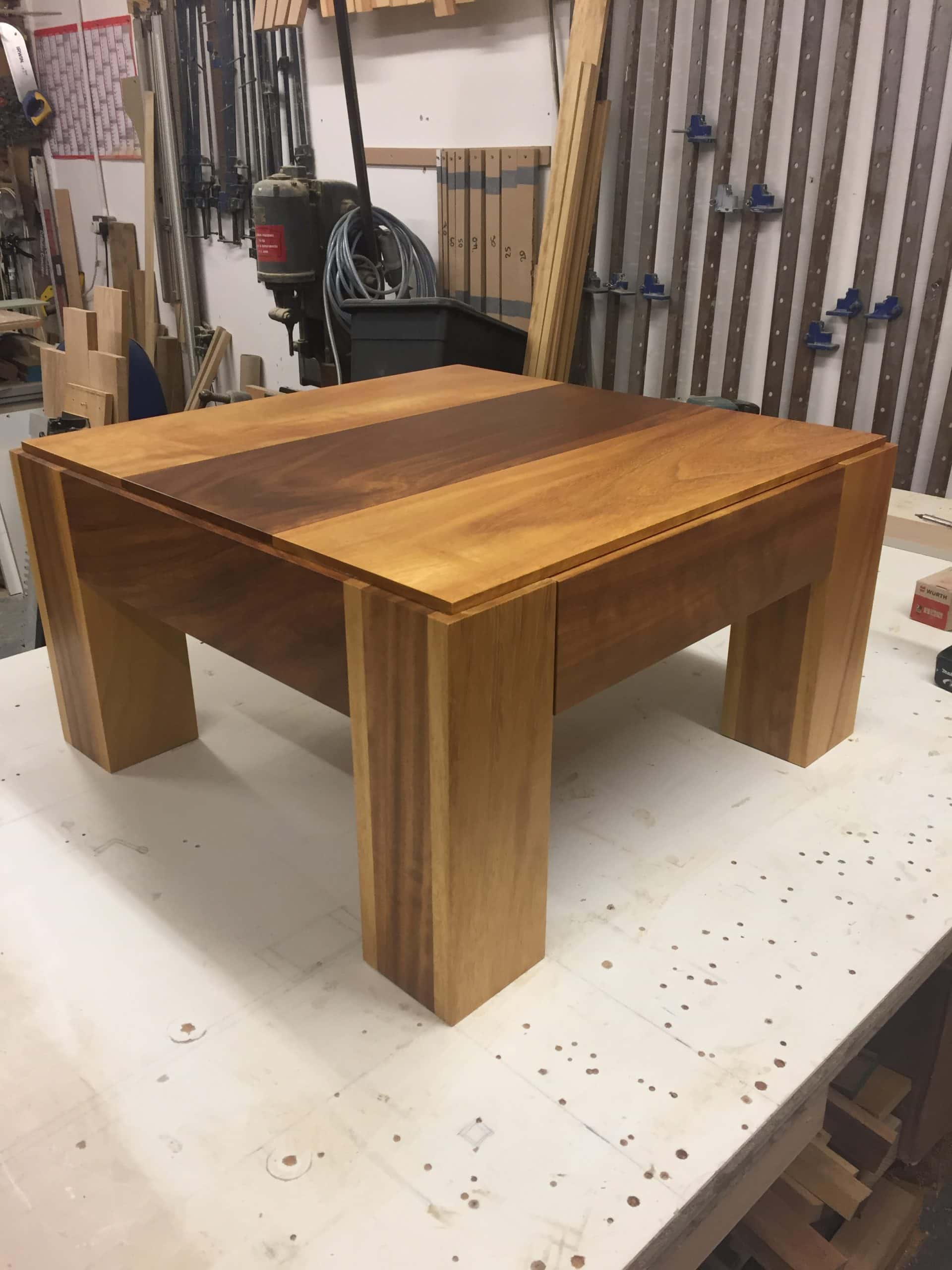 A bespoke coffee table with built in storage underneath
