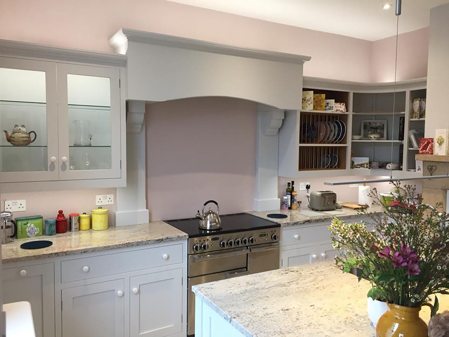 The cooker hood and stove of the bespoke kitchen